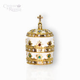 Decorative crown with gold and gemstone details on a white background, branded 'Crowns & Regalia'.